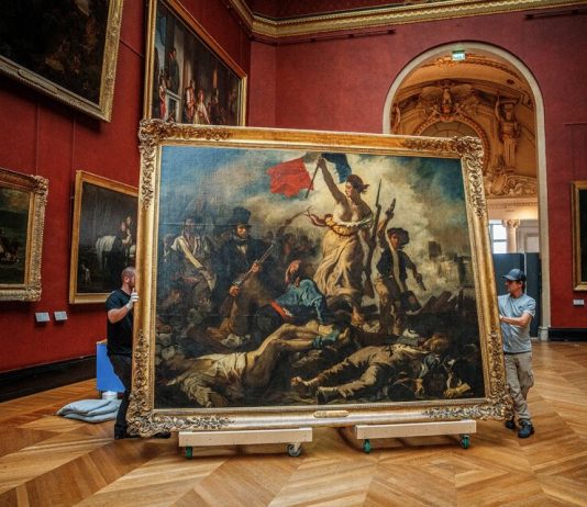 La Libertad guiando al pueblo en el Louvre