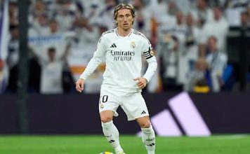 ¿Cuántos partidos tiene Modric con el Real Madrid?