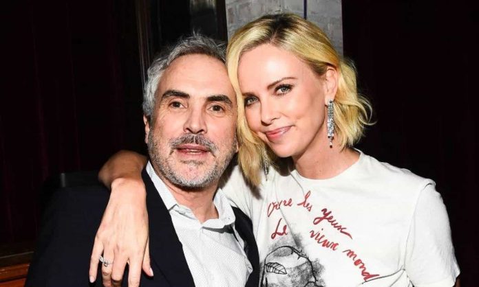 Alfonso Cuarón y Charlize Theron Philip K. Dick