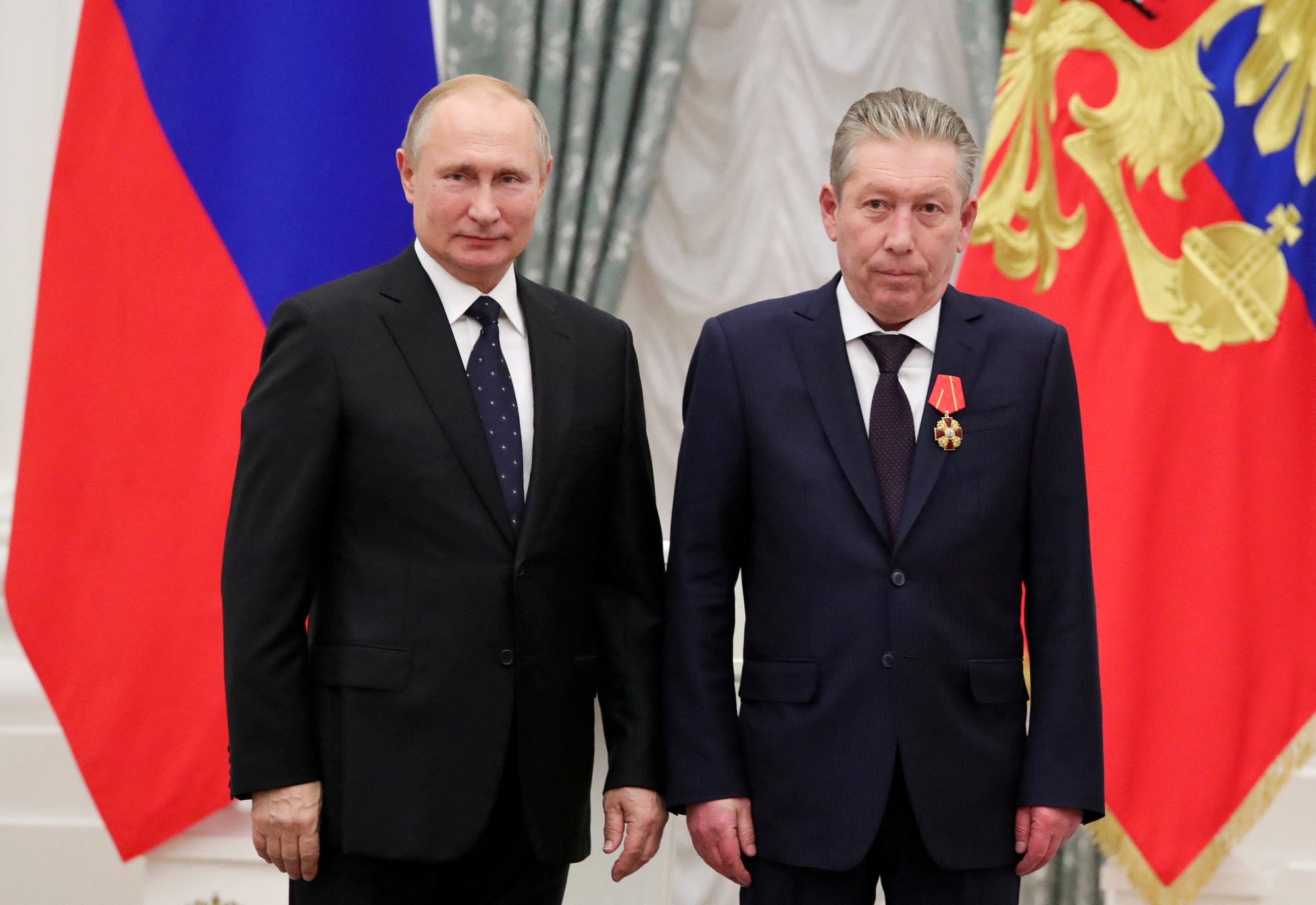 Russian President Putin and Lukoil First Executive Vice President Maganov attend an award ceremony in Moscow