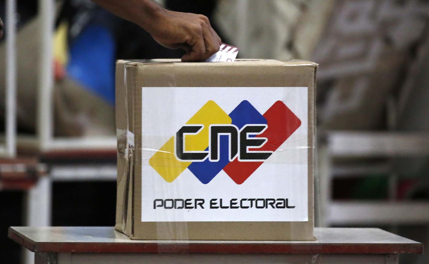 A voter casts a ballot during the Constituent Assembly election in Caracas