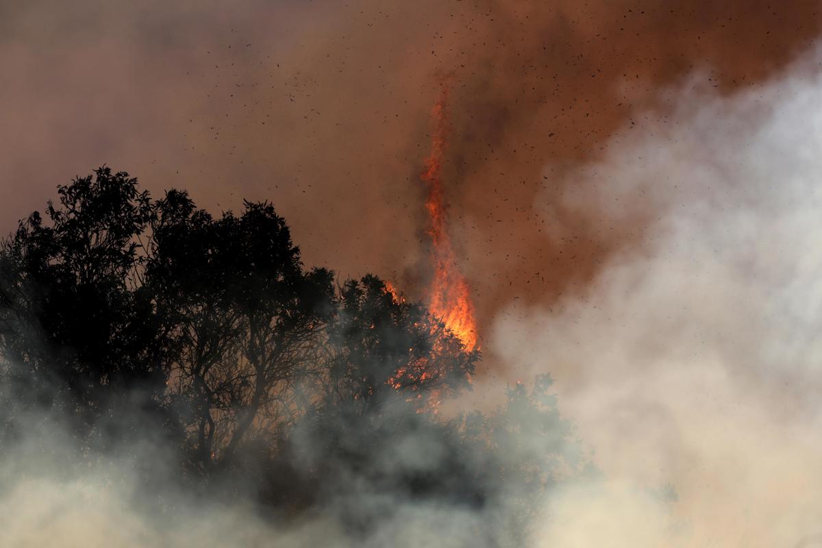 Wildfires continue to rage through Los Angeles area