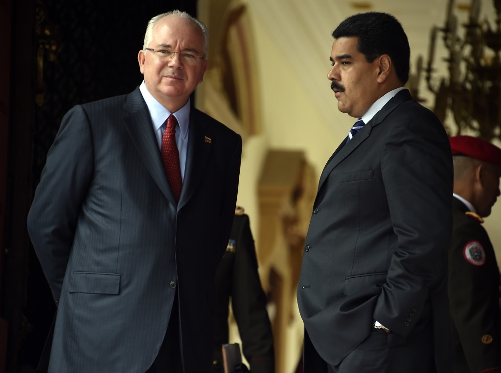 Rafael Ramírez y Nicolás Maduro